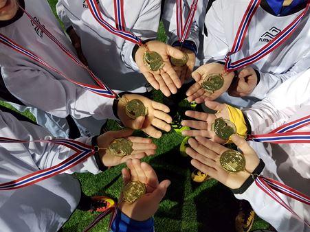 Medaljer i hender