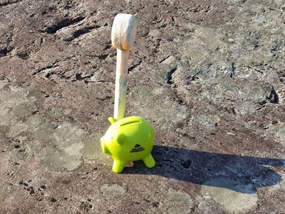 Sparegris Ørland Sparebank ved tomtemerke